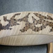 Woodburning by Marian Stratton, bracelet by David
